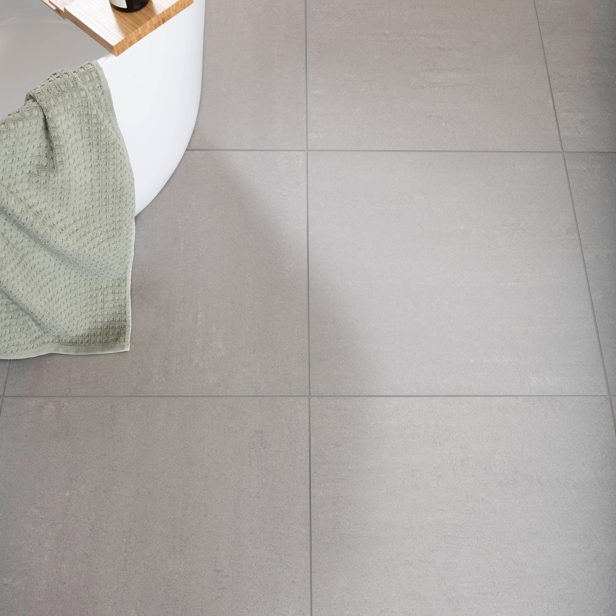 Gems Lounge Stone Effect Matt Anthracite 600x600 — installed room setting, buy floor tile UK
