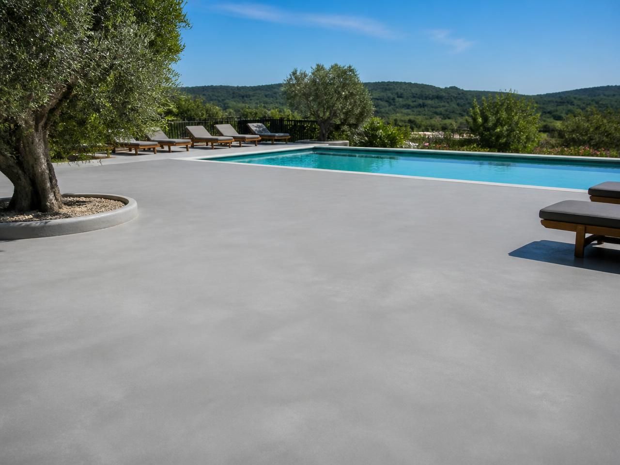 White Concrete Effect Porcelain Outdoor Paving Slabs 600x600mm 20mm laid as a pool surround, installed in 600x600mm